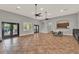 Spacious clubhouse with tile floors, ceiling fans, natural light, and serving bar, perfect for entertaining at 6404 S Goldenrod Rd # A, Orlando, FL 32822