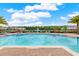 Sparkling pool with plenty of lounge seating offering a relaxing outdoor space with community views at 6404 S Goldenrod Rd # A, Orlando, FL 32822