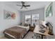 Cozy bedroom with a study desk and modern decor for a comfortable living space at 10183 Peebles St, Orlando, FL 32827