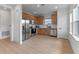 Well-lit kitchen with stainless steel appliances, wooden cabinets and an eat in area with lots of natural light at 10183 Peebles St, Orlando, FL 32827