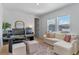 Inviting home office with neutral-toned walls, comfortable furniture, bright windows and a contemporary design at 10183 Peebles St, Orlando, FL 32827