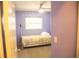 Cozy bedroom with a playful design and carpeted floor at 110 N Alderwood St, Winter Springs, FL 32708