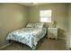 This bedroom features neutral walls, carpet floors, and a ceiling fan at 110 N Alderwood St, Winter Springs, FL 32708