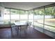 Spacious screened patio with outdoor seating overlooking the backyard at 110 N Alderwood St, Winter Springs, FL 32708