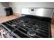 The kitchen features a black Maytag gas range and cooktop at 110 N Alderwood St, Winter Springs, FL 32708