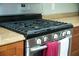 Close-up of the stainless steel stove and oven at 110 N Alderwood St, Winter Springs, FL 32708