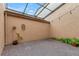 Outdoor patio with brick flooring, partial glass roof, string lights, and space for outdoor seating at 1122 Washington Ave # 7, Winter Park, FL 32789