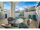 The backyard features a pool, ample seating and privacy from neighbors at 1128 Challenge Dr, Davenport, FL 33896