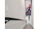 Carpeted stairwell with a Spiderman art decoration at 1128 Challenge Dr, Davenport, FL 33896