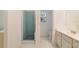 Clean bathroom featuring a tiled shower and a sink vanity at 1243 Tangerine Cir, Lady Lake, FL 32159