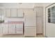 Open kitchen featuring ample cabinetry and a bright, airy atmosphere at 1243 Tangerine Cir, Lady Lake, FL 32159