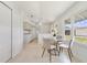 Cozy kitchen area with a bright breakfast nook and ample natural light at 1243 Tangerine Cir, Lady Lake, FL 32159