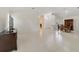Open living room features tile flooring, dining area, and a bright open floor plan at 1243 Tangerine Cir, Lady Lake, FL 32159