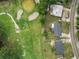 An aerial view of a home's location next to a well-manicured golf course at 136 Triplet Lake Dr, Casselberry, FL 32707