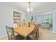 The dining room showcases a large table perfect for Gathering meals, along with a built-in shelf at 136 Triplet Lake Dr, Casselberry, FL 32707