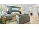 Comfortable living room with neutral colors and decor at 136 Triplet Lake Dr, Casselberry, FL 32707