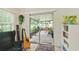 Covered porch area with sliding glass doors leading to backyard at 136 Triplet Lake Dr, Casselberry, FL 32707