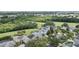 Beautiful homes line a lush golf course, creating a serene and picturesque community setting at 1467 Selbydon Way, Winter Garden, FL 34787