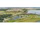 Community featuring a pond, road and parking offering a serene and convenient living environment at 1467 Selbydon Way, Winter Garden, FL 34787