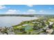 Breathtaking aerial view showcasing community amenities and stunning lake views, perfect for recreation and relaxation at 1467 Selbydon Way, Winter Garden, FL 34787