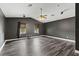 The bonus room is spacious, featuring recessed lighting, a ceiling fan, and large windows at 1467 Selbydon Way, Winter Garden, FL 34787