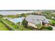 Beautiful clubhouse with a community pool surrounded by manicured landscaping, perfect for relaxation at 1467 Selbydon Way, Winter Garden, FL 34787