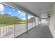 Spacious covered patio with golf course views, perfect for relaxation and entertaining at 1467 Selbydon Way, Winter Garden, FL 34787