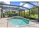 Enclosed pool with brick pavers, planters, and a small waterfall feature at 1467 Selbydon Way, Winter Garden, FL 34787