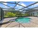 Enclosed pool with brick pavers, planters, and a small waterfall feature at 1467 Selbydon Way, Winter Garden, FL 34787