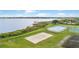 Lakeside recreation area with a sand volleyball court, ice rink, and tennis court provides ample activities at 1467 Selbydon Way, Winter Garden, FL 34787