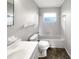 Bathroom with a tub/shower combo, white tile surround, and modern vanity at 1623 Crestlawn Ave, Orlando, FL 32811