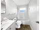 Renovated bathroom with tub and shower combo and sleek fixtures at 1623 Crestlawn Ave, Orlando, FL 32811