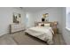 Bedroom featuring neutral decor, a comfortable bed, side tables, a dresser, and natural light from the window at 164 14Th Ave, Longwood, FL 32750