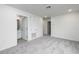 This bedroom features neutral carpet and white paint with an attached bathroom at 164 14Th Ave, Longwood, FL 32750