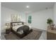 Bedroom with soft carpet, natural light from the window, and calming décor creating a relaxing retreat at 164 14Th Ave, Longwood, FL 32750