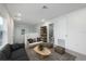 Comfortable loft space with carpet, neutral furniture, and access to a bathroom, ideal for a lounge or play area at 164 14Th Ave, Longwood, FL 32750