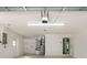 Clean and spacious garage with extra storage and attached utility space at 175 Cliff St, Deland, FL 32720