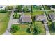 Bird's eye view of a home featuring a well-maintained lawn and mature landscaping at 1880 Lorraine Way, St Cloud, FL 34769