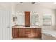 Spacious bathroom with double vanity, soaking tub, and a separate shower at 1880 Lorraine Way, St Cloud, FL 34769