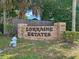 Brick sign that says 'Lorraine Estates' at 1880 Lorraine Way, St Cloud, FL 34769