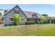 Attractive single-Gathering home with vibrant landscaping and well-maintained lawn at 1880 Lorraine Way, St Cloud, FL 34769