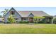 Charming single-story home with landscaped front yard and inviting curb appeal at 1880 Lorraine Way, St Cloud, FL 34769