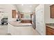 Spacious kitchen with wooden cabinets and stainless steel appliances at 1880 Lorraine Way, St Cloud, FL 34769