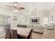 Inviting living area with vaulted ceilings, ceiling fans, and comfortable seating at 1880 Lorraine Way, St Cloud, FL 34769
