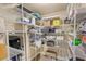 Spacious walk-in pantry featuring metal shelving for organization at 1880 Lorraine Way, St Cloud, FL 34769