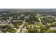 An aerial view of the neighborhood, surrounded by lush greenery and trees at 1919 River Park Blvd, Orlando, FL 32817
