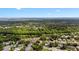 Scenic aerial view of the community surrounded by lush green forests and a winding river at 1919 River Park Blvd, Orlando, FL 32817