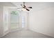 Bedroom featuring plush carpet, vaulted ceiling, and bay window at 1919 River Park Blvd, Orlando, FL 32817