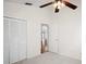 Bright bedroom featuring neutral carpet, ceiling fan, and closet space at 1919 River Park Blvd, Orlando, FL 32817