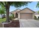 Charming single-story home with manicured landscaping, a two-car garage, and inviting curb appeal at 1919 River Park Blvd, Orlando, FL 32817